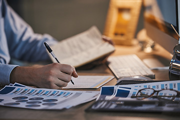 Image showing Businessman, hands or writing on documents in night office for data analytics, target audience research or marketing kpi review. Zoom, worker or employee working late on paper or advertising feedback