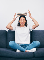 Image showing Student or woman with books balance on head for study, education or university time management and reading. Knowledge, learning and young college person on sofa with history, philosophy or literature