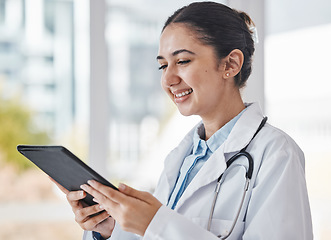 Image showing Healthcare, research and doctor on tablet in hospital for medical report, test results and online consultation. Insurance, technology and woman health worker with digital tech for patient telehealth