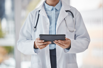 Image showing Healthcare, research and hands of doctor on tablet in hospital for medical report, results and online consultation. Insurance, wellness and woman health worker for digital tech for patient telehealth