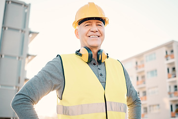 Image showing Construction worker, senior man and architecture, renovation and building industry with portrait outdoor. Property development, success and leader with helmet for safety, builder at work site in city
