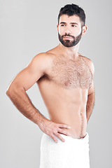 Image showing Health, skincare and grooming, man with towel after shower or bathroom routine with muscular body care in studio. Spa, wellness and cleaning skin treatment for male model isolated on grey background.