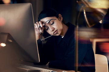 Image showing Stress, tired and business woman at night working on computer for project, report and strategy deadline. Burnout, mental health and female worker in dark office frustrated, fatigued and overworked