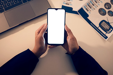 Image showing Top view, hands and woman with phone mock up in office for branding, web browsing or social media. Technology, screen mockup and female employee with smartphone for marketing or advertising at night.