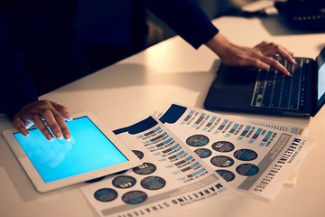 Image showing Hand, tablet and laptop with documents in night at office for research, analysis and marketing strategy. Woman, mobile touchscreen and hands with iot, paper or goals in seo on website ui in workplace