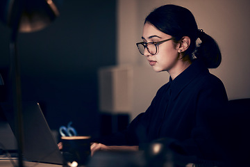 Image showing Woman, night office and laptop for business, coding and strategy in dark startup company. Female working overtime online with technology on website, computer programmer and search internet analytics