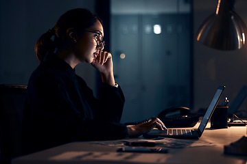 Image showing Serious woman, night business and laptop for planning, research and strategy in dark startup office. Female working overtime on computer technology, online website and network at table for analytics