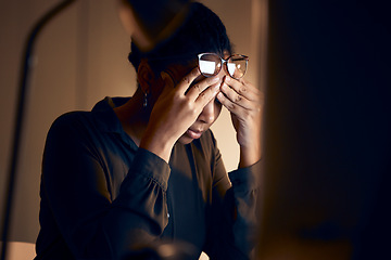 Image showing Stress, burnout and business black woman at night working on project, report and strategy deadline. Headache, mental health and female in dark office frustrated, tired and work problem on computer