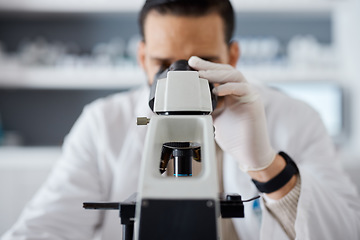 Image showing Medical, microscope and research with a man scientist at work in a laboratory for innovation or development. Science, analytics and biotechnology with a male doctor working in a lab for breakthrough