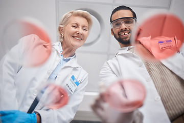 Image showing Research, DNA and science by scientists in analytics with sample in lab smile and happy for results. Professional, expert and medical technician in a laboratory as teamwork, team and collaboration