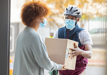 Image showing Black man, mask and delivery with box for woman at house for logistics, cargo and safety from covid 19. Young african courier, package and shipping service with stock, helmet and e commerce in city