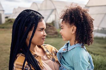 Image showing Mother, kids and sustainable farm on field for sustainability, growth and eco environment, Agriculture of happy black family, mom and children in garden, countryside greenhouse and smile in nature