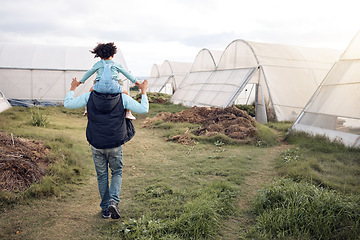 Image showing Family, father and girl walking on farm for quality time, bonding and relax in countryside field. Agriculture, sustainability farming and back of farmer dad and child outdoors, enjoy nature and happy