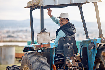 Image showing Wave, greeting and man on a tractor for farming, agriculture work and working on a field in Spain. Happy, communication and farmer driving machine and waving for ecology and sustainability in nature