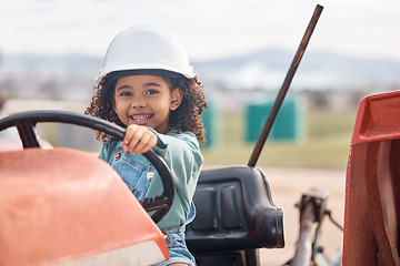 Image showing Girl child in tractor, portrait and farming transport, sustainability and learning field work with development and fun. Childhood, farm machinery and farmer in training, growth and kid in agriculture