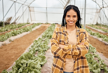 Image showing Black woman, farmer smile in portrait with agriculture and farming in greenhouse, sustainability with crop harvest. Environment, farm and fresh vegetable produce, green and eco friendly production