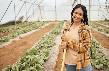 Image showing Black woman, farmer happy in portrait with agriculture and farming in greenhouse, sustainability with crop harvest. Environment, farm and fresh vegetable produce, green lettuce production and agro