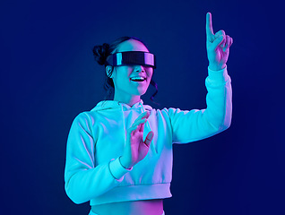 Image showing Woman, metaverse and virtual reality glasses for futuristic gaming, cyber and 3d world. Gamer person excited with hand for wow ar, digital experience and vr ux cyberpunk blue background tech app