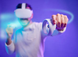 Image showing Virtual reality, metaverse and man fight on game with vr glasses for futuristic cyber 3d world. Gamer person with hand controller for ar app, digital experience and purple background overlay gaming