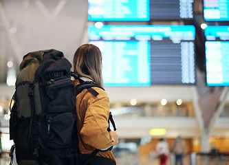 Image showing Travel, backpack and woman in airport on a trip, vacation or holiday happy on an international journey to city. Airplane, excited and female happy traveling from an airline building to board flight