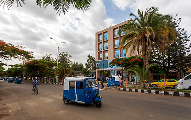 Image showing tigray woman walking in center of of Aksum, Ethiopia Africa