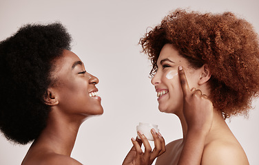 Image showing Cream, face product and women smile with diversity and happiness for sleepover skincare and facial. Wellness, women and spa aesthetic with lotion and moisturizer for friends cosmetic treatment