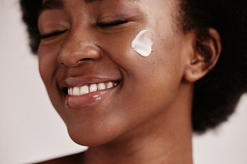 Image showing Dermatology, face shine and cream of a model with facial mask, skincare and sunscreen in studio. Isolated, white background and self care treatment of a young person with cosmetic and collagen lotion