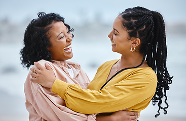 Image showing Travel, friends and happy black women on beach embrace while on fun ocean holiday in Cancun. Smile, friendship and vacation at the sea, woman and friend or partner laughing at funny joke and hugging.