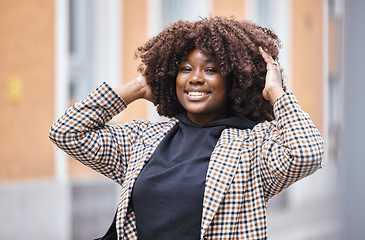 Image showing Black woman, portrait smile and afro for fashion, style or hair in city travel, trip or journey. Happy African American female touching stylish curls smiling in happiness or traveling in South Africa