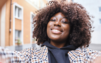 Image showing Travel influencer, portrait or afro selfie in city, urban holiday or vacation on fashion, social media or live streaming blog. Smile, happy or black woman face in pov photography or profile picture