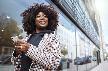 Image showing Black woman, afro or phone in city travel for gps location, 5g internet maps or holiday vacation schedule on urban sidewalk. Smile, happy or fashion student on mobile technology for social media app