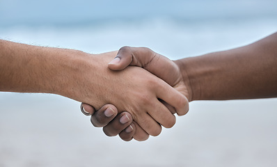 Image showing Diversity, hand and handshake on mockup for community, trust or unity on blurred background. People shaking hands in solidarity for deal, partnership or teamwork agreement, victory or winning goals