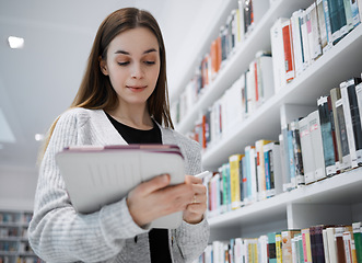 Image showing University, writing or woman in library with tablet for research, education or learning. Bookshelf, books or girl student on tech for scholarship search or planning school project at collage campus