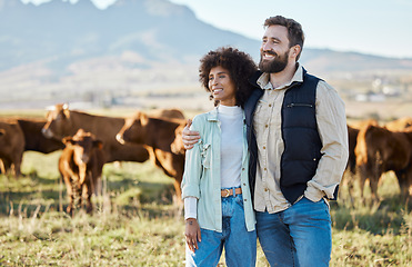 Image showing Happy, cow and relax with interracial couple on farm for agriculture, nature and growth. Teamwork, animals and hug with man and black woman in grass field for sustainability, cattle and environment