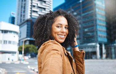 Image showing Selfie, urban city and black woman for travel, fashion influencer or portrait update of her journey in street. Walking, USA New York and happy face of young person in road with natural hair or afro