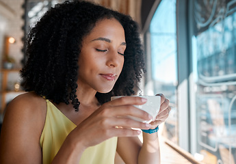 Image showing Black woman, relax or smelling coffee in cafe shop or restaurant for lunch break, mindfulness or self love zen. Thinking, student or person with tea cup aroma for drinking, inspiration or calm peace