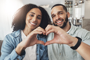 Image showing Love, heart hand sign and portrait couple enjoy quality time together, bonding or relax on home living room sofa. Happiness, emoji gesture or happy marriage people, man or woman in good health