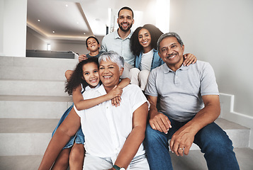 Image showing Love, stairs and group portrait of happy family bonding, hug and enjoy quality time together in their house. Holiday smile, happiness and relax children, parents and grandparents in vacation home