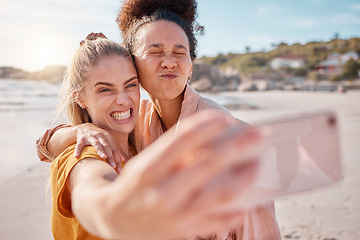 Image showing Selfie, women and friends on beach, funny and summer vacation for break, bonding and playful together. Love, females or crazy ladies on seaside holiday, smartphone for pictures or memories of getaway