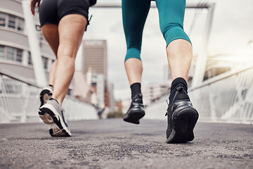 Image showing Fitness, city or legs running in training, workout or cardio exercise on New York bridge for a marathon. Zoom, runners or friends athletes with sports motivation, mindset or resilience for goals