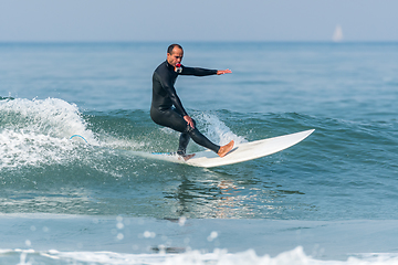 Image showing Surfing the waves