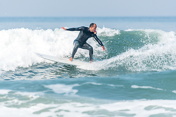 Image showing Surfing the waves