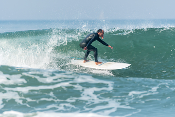 Image showing Surfing the waves