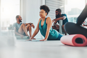 Image showing Black woman, yoga and meditation class with exercise for fitness, peace and wellness. Group of people in gym studio for holistic workout, mental health and body balance with zen mind and energy