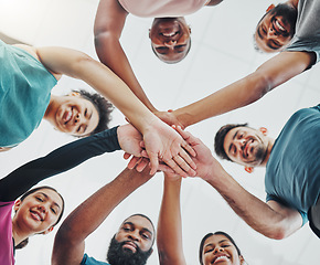 Image showing Fitness group, hands of people portrait from bottom together with united teamwork and happiness. Motivation, circle and exercise support of training team with solidarity, trust and goal celebration