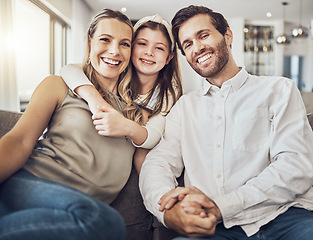 Image showing Portrait, mother or father with a girl to relax as a happy family in living room bonding in Australia with love or care. Hugging, sofa or parents smile with kid enjoying quality time on a fun holiday