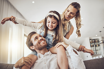 Image showing Family, bonding and airplane game in living room, house or relax home in freedom activity, kids energy or fun playing. Smile, happy and flying child on father shoulders in fantasy support with mother