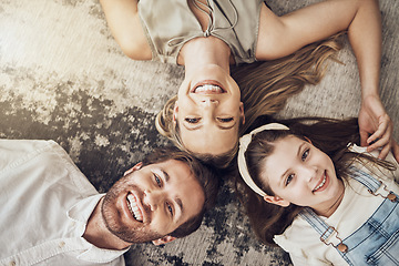 Image showing Portrait, mother or father with a child on floor relaxing as a happy family bonding in Australia with love or care. Carpet, top view or parents smile with girl enjoying quality time on a fun holiday