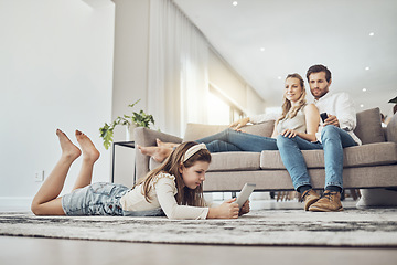 Image showing Family, relax or child on tablet in living room, house or home live streaming, movies channel or internet show bonding. Parents, child or kid girl on technology games, television or watching tv media