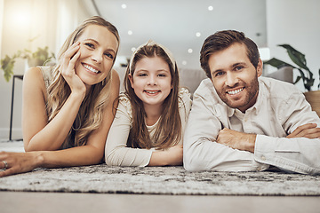 Image showing Portrait, mother or father with a girl on floor relaxing as a happy family bonding in Australia with love or care. Carpet, trust or parents smile with kid enjoying quality time on a fun holiday